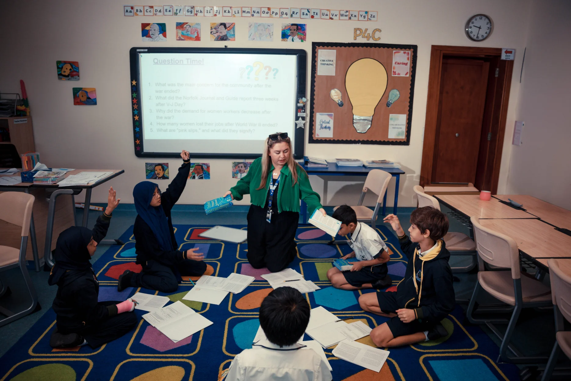 Students participating in a Philosophy for Children (P4C) session at Newton Group of Schools to develop critical and creative thinking.